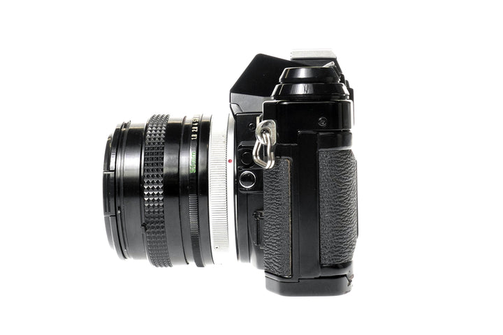 Canon AE-1 Program 35mm SLR Film Camera w/ FD 50mm f1.8 S.C. Lens