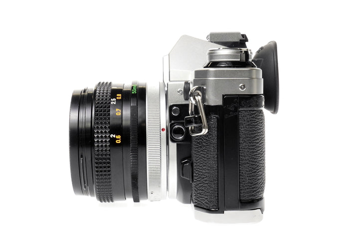 Canon AE-1 35mm SLR Film Camera w/ FD 50mm f1.8 S.C. Lens
